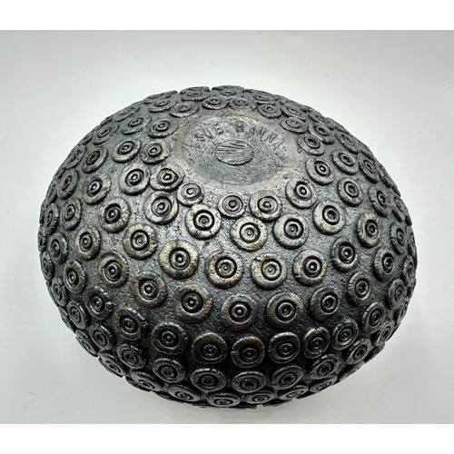 317 - Sue Hanna (born 1963); A burnished oval stoneware bowl with textured surface, 13cm h x 19cm d approx... 