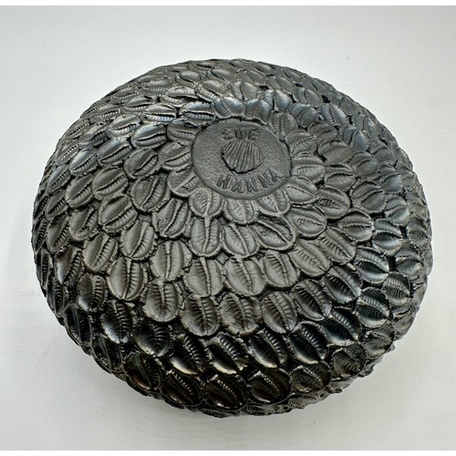 319 - Sue Hanna (born 1963); A burnished circular stoneware bowl with textured surface, 8cm h x 17cm d.