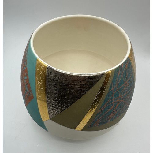 321 - Tony Laverick (born 1961); a large bowl glazed with multi textual qualities, painted TL mark dated 2... 