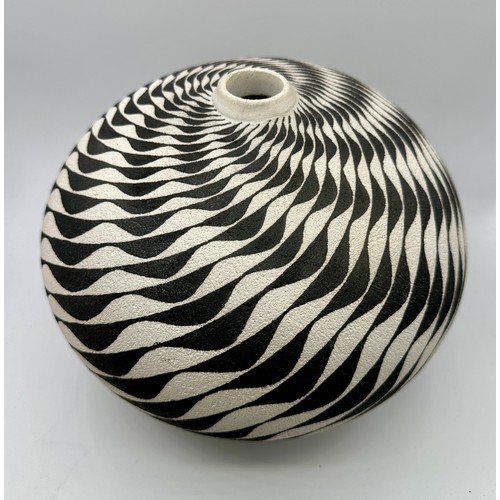 329 - Ilona Sulikova (born 1949); a raku vessel decorated with a wave pattern, height 23cm approx.