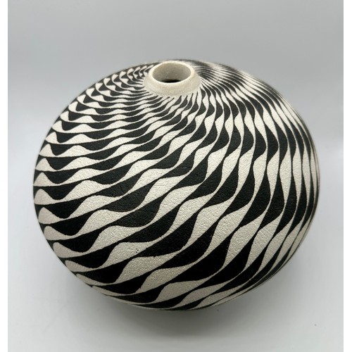 329 - Ilona Sulikova (born 1949); a raku vessel decorated with a wave pattern, height 23cm approx.