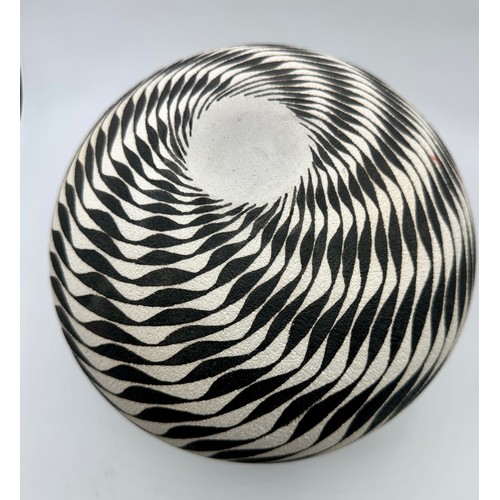 329 - Ilona Sulikova (born 1949); a raku vessel decorated with a wave pattern, height 23cm approx.