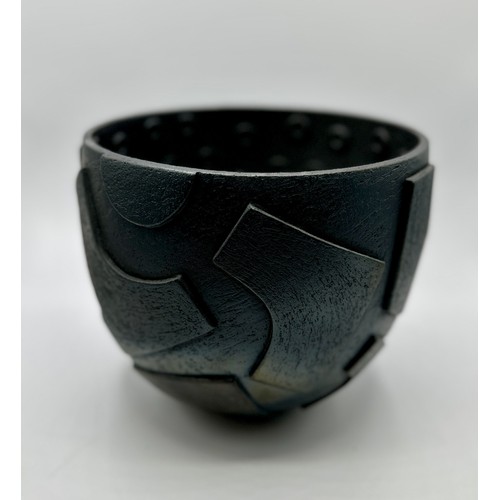 332 - Sue Hanna (born 1963); A burnished circular stoneware bowl with relief armoured surface. The decorat... 