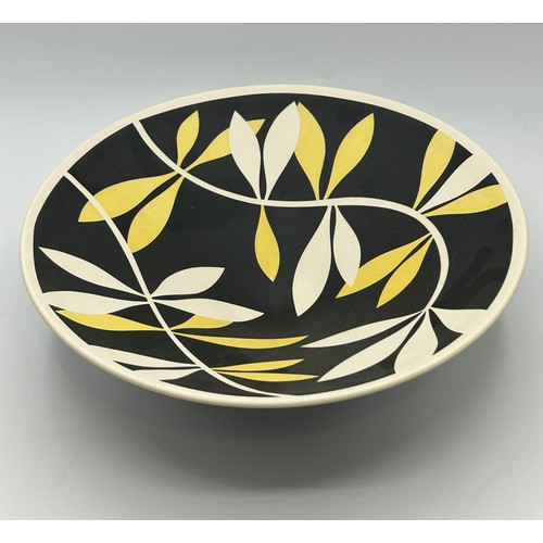 313 - Georgie Gardiner yellow, black and white leaf bowl crafted from high fired earthenware. 9cm h x 28.5... 