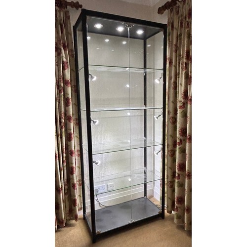 1252 - Three tall black metal display cabinets by Cabinets and Showcases Ltd, each with 4 shelves and light... 