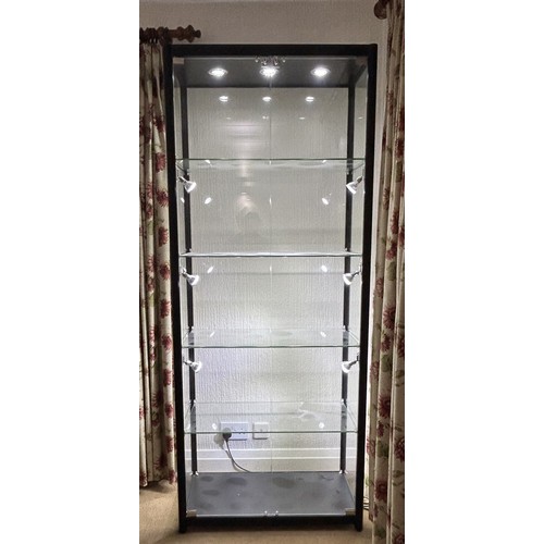 1252 - Three tall black metal display cabinets by Cabinets and Showcases Ltd, each with 4 shelves and light... 