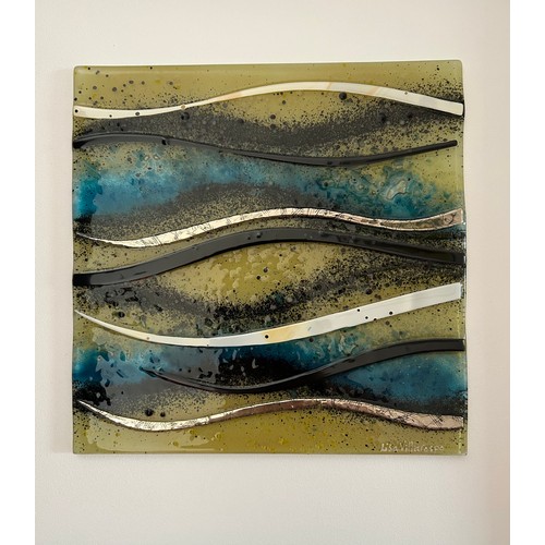 414 - A Lisa Villarospo fused glass piece of wall art depicting waves in a deep black frame 52 x 52cm.