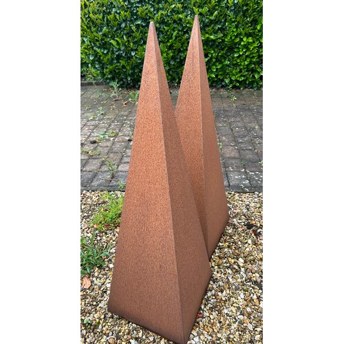 12 - A pair of Arthur Francis Medbourne steel outdoor obelisk sculptures 124cm h.