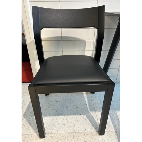 107 - A Muuto square black contemporary wooden table 75 x 75cm x 74cm h together with two black Case chair... 