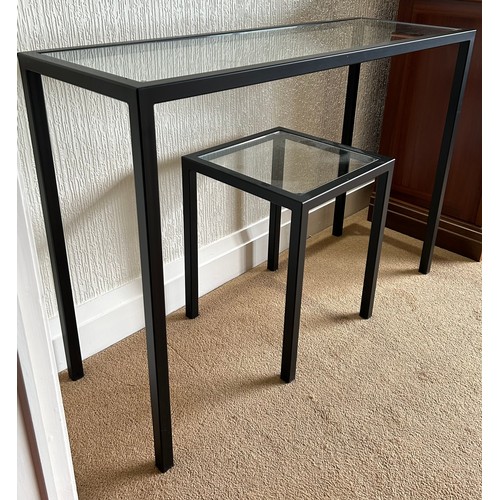 109 - Two black metal and glass tables. Hall table 100 w x 35 d x 72cm h. Coffee table 35 w x 35 d x 45cm ... 