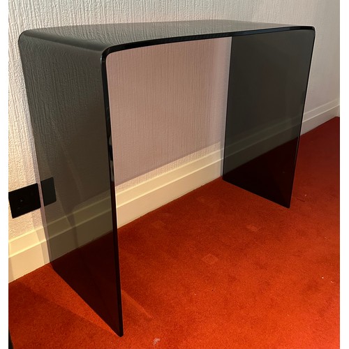 112 - A black glass contemporary hall table. 90 w x 36 d x 75cm h.