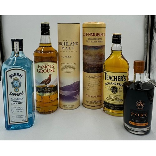 1229 - A collection of unopened spirits to include Glenmorangie single highland Scotch whisky boxed, Teache... 