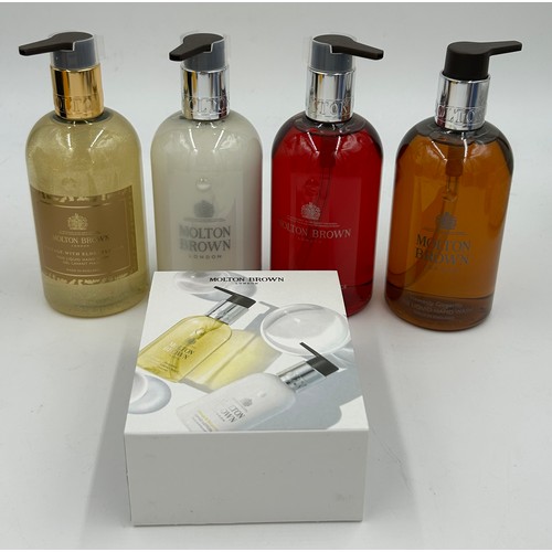 899 - A large quantity of Designer fragrances and lotions to include an Acqua Di Parma Black Cube scented ... 