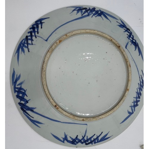 942 - Two 19thC Chinese blue & white plates in 'Prunus Hawthorne' Pattern 30cm diameter.