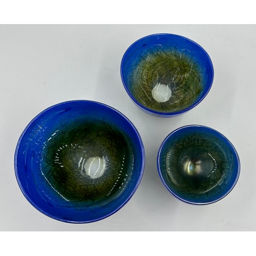 432 - Isle of Wight glass designed by Timothy Harris. Three 'Blue Seagrass' open bowls. Large 14cm h, Medi... 