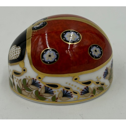 345 - Three Royal Crown Derby paperweights to include an Owl 8cm h, a Blue Tit 7cm h and a Ladybird 4cm h ... 