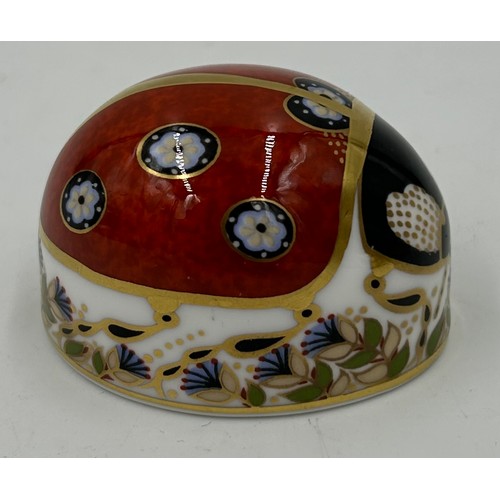 345 - Three Royal Crown Derby paperweights to include an Owl 8cm h, a Blue Tit 7cm h and a Ladybird 4cm h ... 