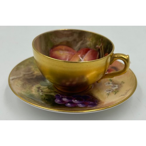 295 - A Royal Worcester miniature cup & saucer decorated with fruit on a moss background and gilt edging, ... 