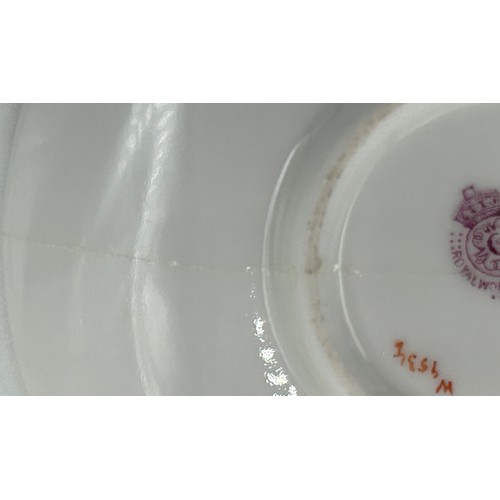 295 - A Royal Worcester miniature cup & saucer decorated with fruit on a moss background and gilt edging, ... 