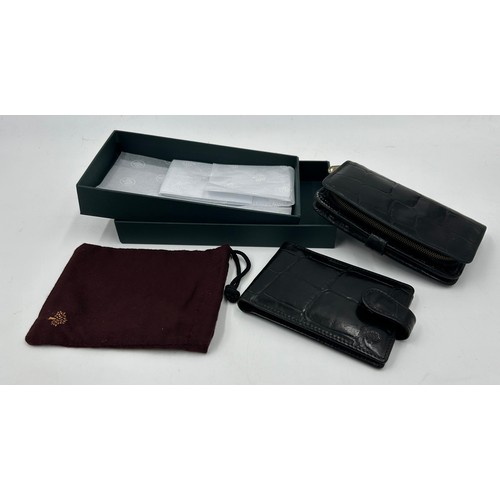 902 - A Mulberry Leather Wallet in black reptile print with zipped coin purse and three note compartments,... 