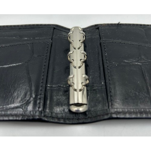 902 - A Mulberry Leather Wallet in black reptile print with zipped coin purse and three note compartments,... 