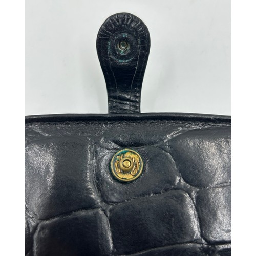 902 - A Mulberry Leather Wallet in black reptile print with zipped coin purse and three note compartments,... 