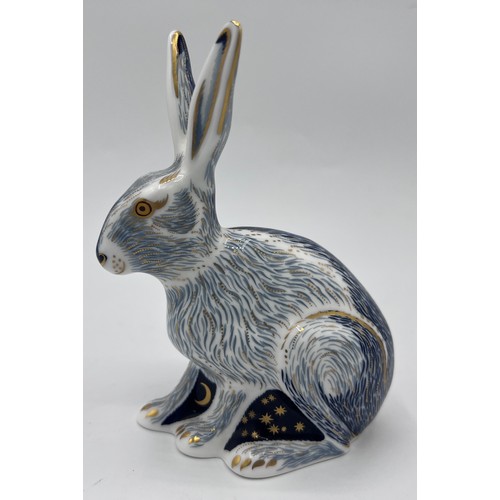 378 - A Royal Crown Derby Starlight Hare paperweight, Collectors Guild Exclusive 13cm h. Gold stopper.