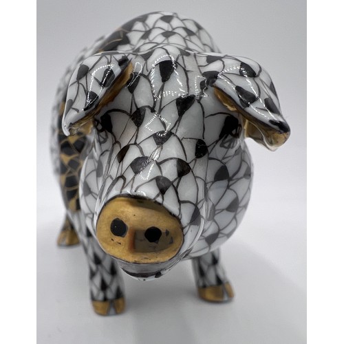 385 - A Herend First Edition, limited edition pig, painted in black and gold, no. 15663, 243 of 500. 13cm ... 