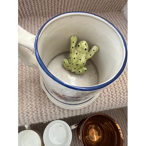 272 - A quantity of mainly 19thC mugs and jug to include a 20thC frog surprise mug, commemorative chapel m... 