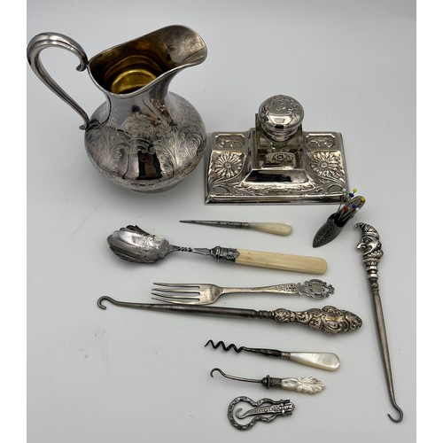 751 - Silver and silver plated items to include Mr Punch button hook Birmingham 1909, plated Art Nouveau i... 