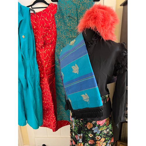 892 - A quantity of vintage costume to include 1960’s evening dresses, feather hat, shawl with gold thread... 