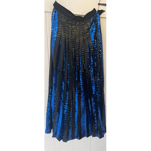 893 - A blue and black sequinned Caroline Charles evening skirt and blouse. Labelled size 12.