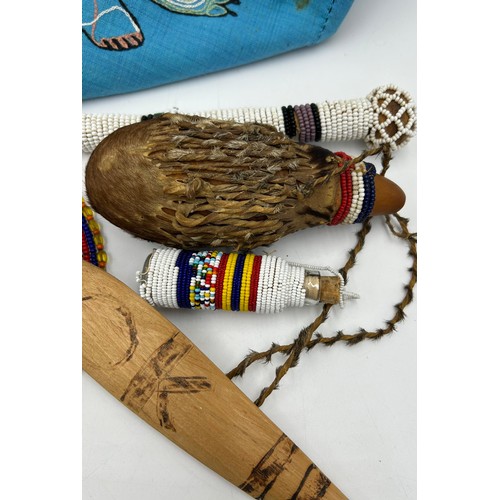 931 - Traditional African tribal pieces to include Maasai beaded necklaces, a beaded dance stick, water ca... 