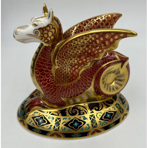 357 - A boxed Royal Crown Derby limited edition The Wyvern paperweight, 528/2000 13cm h. Certificate and g... 