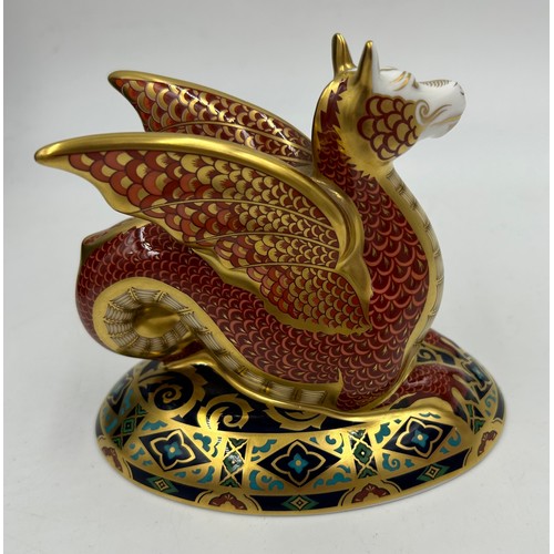 357 - A boxed Royal Crown Derby limited edition The Wyvern paperweight, 528/2000 13cm h. Certificate and g... 