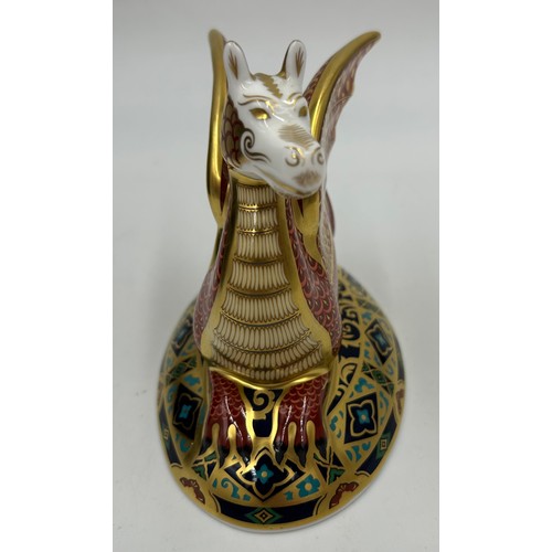 357 - A boxed Royal Crown Derby limited edition The Wyvern paperweight, 528/2000 13cm h. Certificate and g... 