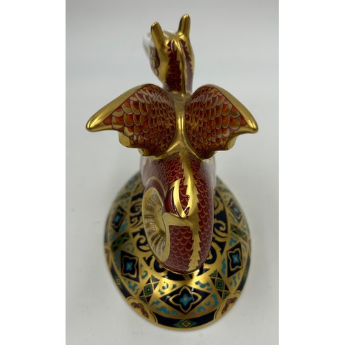 357 - A boxed Royal Crown Derby limited edition The Wyvern paperweight, 528/2000 13cm h. Certificate and g... 