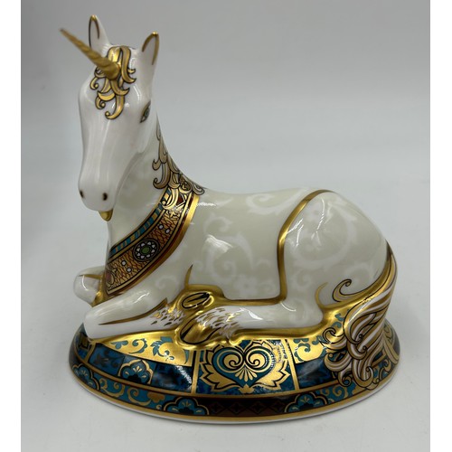 359 - A boxed Royal Crown Derby limited edition Unicorn paperweight, 364/2000 14cm h. Multiple signatures ... 