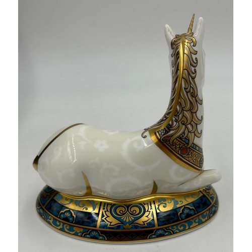 359 - A boxed Royal Crown Derby limited edition Unicorn paperweight, 364/2000 14cm h. Multiple signatures ... 