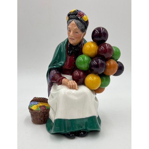 362 - A collection of Royal Doulton to include 'Embroidering' HN 2855 19cm h, 'The Old Balloon Seller' HN ... 