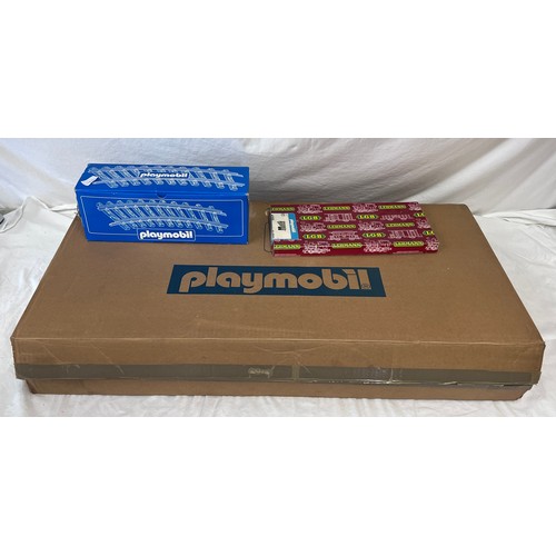 1074 - A large collection of Playmobil to include 4032 Pacific Railroad large scale trainset, appears compl... 