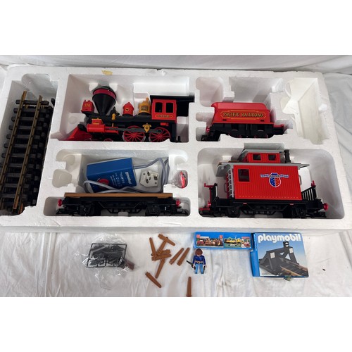 1074 - A large collection of Playmobil to include 4032 Pacific Railroad large scale trainset, appears compl... 