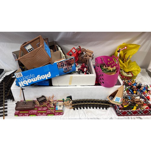 1074 - A large collection of Playmobil to include 4032 Pacific Railroad large scale trainset, appears compl... 