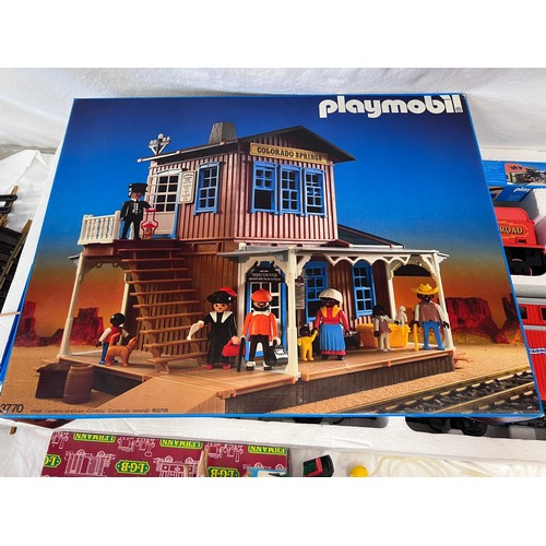 1074 - A large collection of Playmobil to include 4032 Pacific Railroad large scale trainset, appears compl... 