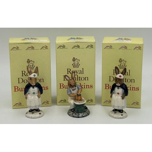 266 - Royal Doulton Nurse Bunnykins DB74 with red cross to hat and apron and DB74 with green cross togethe... 