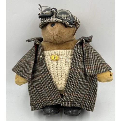 1083 - A selection of bears to include a Gabrielle design bear with cape, deer stalker and goggles approx. ... 