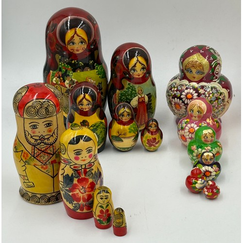 365 - A collection of 20thC Russian and USSR  wooden Matryoshka graduating nests of dolls and other folk a... 