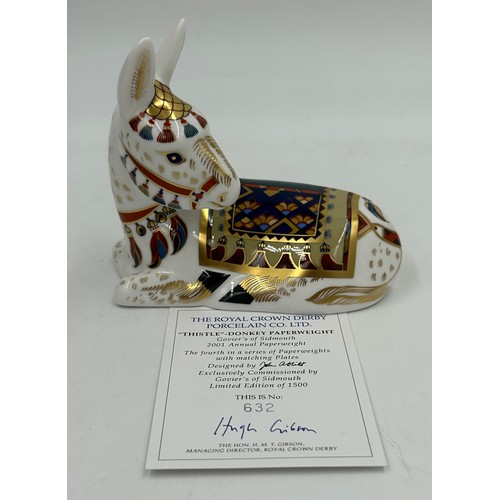 375 - Four Royal Crown Derby paperweights to include Thistle Donkey limited edition 632/1500, Holly Donkey... 