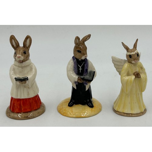 263 - Five Royal Doulton Bunnykins to include Fortune Teller DB218 signed to base, Choir Singer DB223, Vic... 