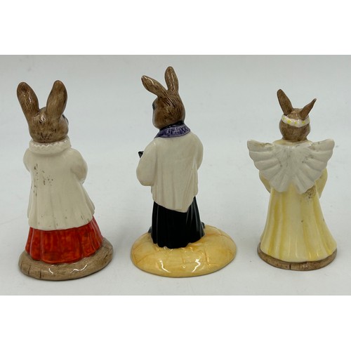 263 - Five Royal Doulton Bunnykins to include Fortune Teller DB218 signed to base, Choir Singer DB223, Vic... 